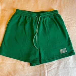 Women’s green athletic shorts size small.